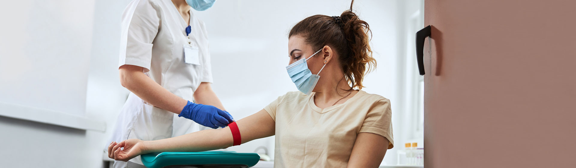 Woman getting her blood work taken