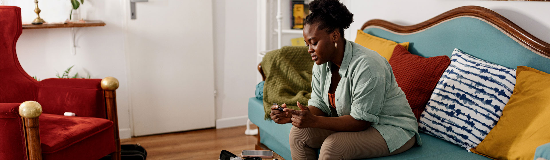 Woman taking a finger prick test