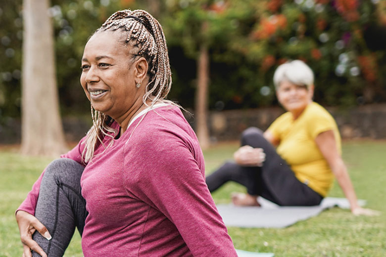 Women exercising in a park